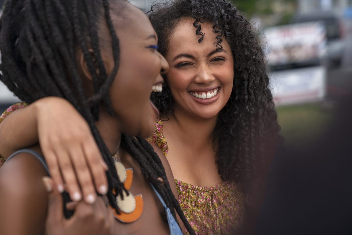 two-female-friends-having-fun-together-outdoors
